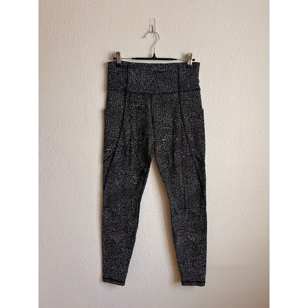 Athleta Salutation Stash Pocket Tight in Rainwater Black Size SMALL